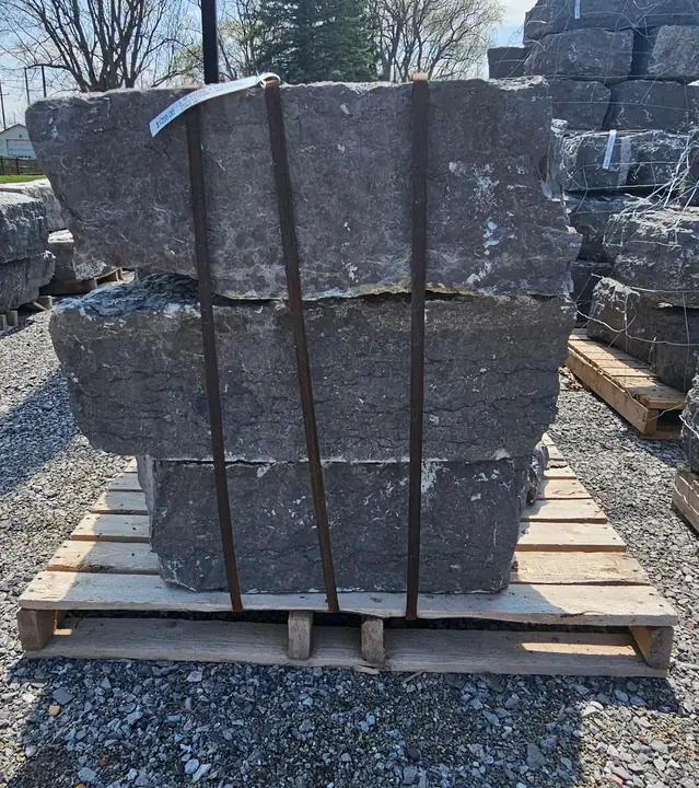Large limestone blocks strapped on a pallet