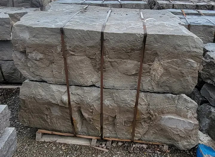Sawn limestone blocks strapped on pallets
