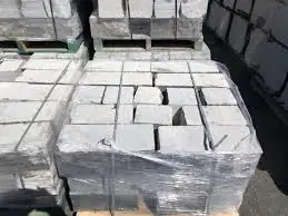 Sawn limestone wall blocks on pallets