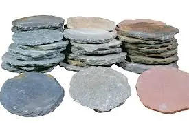 Round slate stepping stones in blue, grey and red